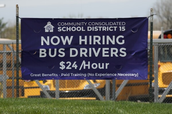 File - A hiring sign seeking bus drivers is posted in Palatine, Ill., Wednesday, April 19, 2023. On Thursday, the Labor Department reports on the number of people who applied for unemployment benefits last week. (AP Photo/Nam Y. Huh, File)
