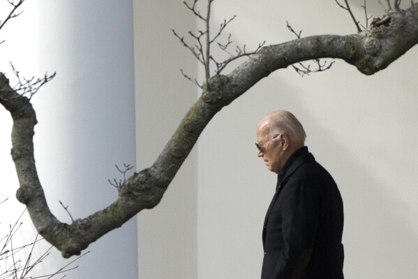 FILE - President Joe Biden walks out of the White House to board Marine One on the South Lawn in Washington, Jan. 12, 2024. Biden is convening top congressional leaders at the White House to press for his $110 billion national security package at a pivotal time. Wednesday afternoon's meeting comes as senators narrow on a landmark immigration deal that could unlock the stalled aid to Ukraine, Israel and other U.S. allies. (AP Photo/Mark Schiefelbein, File)