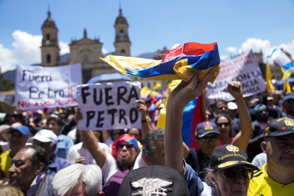 Anti-government protesters gather at Bolivar square against reforms initiated by the government of President Gustavo Petro in Bogota, Colombia, Wednesday, March 6, 2024. (AP Photo/Fernando Vergara)