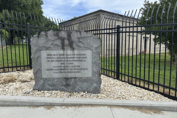 A grave marker honoring Confederate soldiers who died in the Civil War stands on city owned property in Richmond, Virginia, on Friday May 30, 2025. (AP Photo/Olivia Diaz)