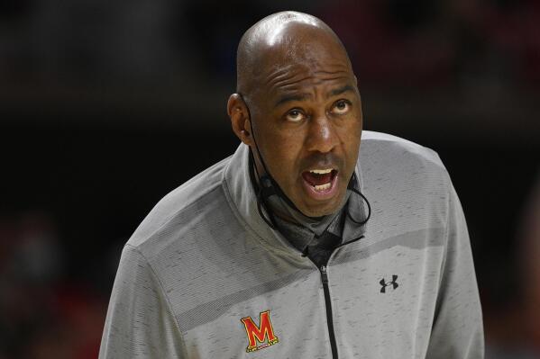 FILE - Maryland interim head coach Danny Manning reacts during the second half of an NCAA college basketball game against Iowa, Thursday, Feb. 10, 2022, in College Park, Md. Louisville head coach Kenny Payne has named former Kansas great and college basketball Hall of Famer Danny Manning as an assistant, a month after the coaching veteran completed an interim stint at Maryland.(AP Photo/Nick Wass, File)
