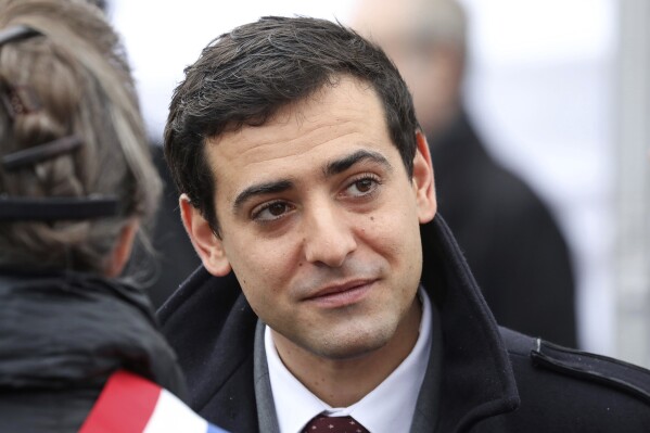 FILE - Former French Presidential political advisor Stephane Sejourne attends a ceremony the Arc de Triomphe in Paris, France, Sunday, Nov. 11, 2018. The new government of France's youngest-ever prime minister Gabriel Attal has been announced Thursday Jan.11, 2024 with only one major change at the foreign ministry, while most high-profile government members remain unchanged. Sejourne, 38, has been named at the prestigious foreign affairs portfolio. (Ludovic Marin/Pool Photo via AP, File)