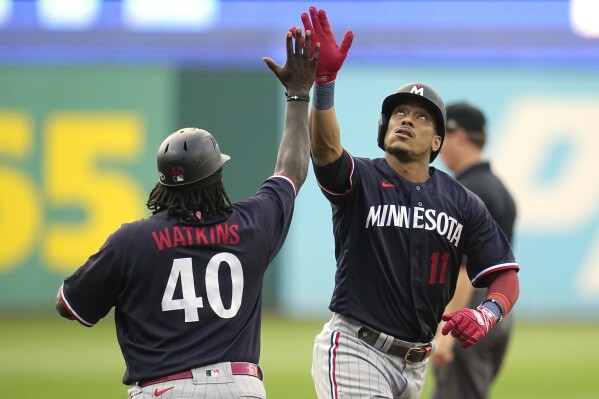 Royce Lewis hits a grand slam, drives in 6 as the AL Central-leading Twins  crush Cleveland 20-6 | AP News