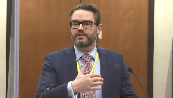 In this image taken from video, defense attorney Eric Nelson speaks as Hennepin County Judge Peter Cahill presides over jury selection, Tuesday, March 23, 2021, at the Hennepin County Courthouse in Minneapolis, in the trial of former Minneapolis police officer Derek Chauvin, who is charged in the May 25, 2020, death of George Floyd. (Court TV via AP, Pool)