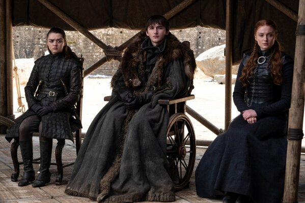
              This image released by HBO shows from left to right Maisie Williams, Isaac Hempstead Wright and Sophie Turner in a scene from the final episode of "Game of Thrones," that aired Sunday, May 19, 2019. (HBO via AP)
            