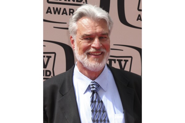 In this photo provided by Kathy Hutchins, Richard Moll arrives at the 2010 TV Land Awards Sony Studios Culver City, Calif., April 17, 2010. Moll, a character actor who found lasting fame as an eccentric but gentle giant bailiff on the original "Night Court" sitcom, has died at age 80. Moll died Thursday, Oct. 26, 2023, at his home in Big Bear Lake, Calif., according to a Jeff Sanderson, a family spokesperson. (Kathy Hutchins/Hutchins Photo via AP)