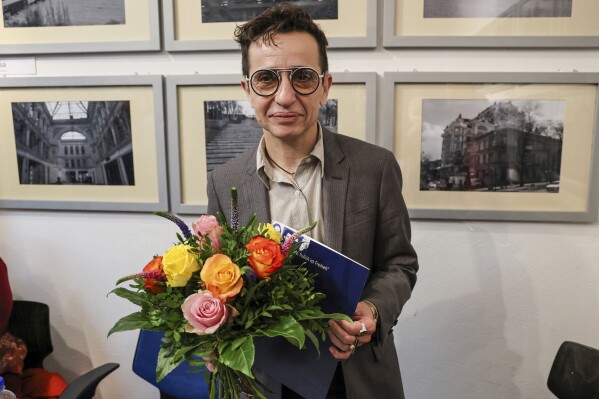 Russian American writer Masha Gessen, poses for a photo after receiving the Hannah Arendt Prize. in event room F61, in Bremen, Germany, Saturday, Dec. 16, 2023. Gessen has received a German literary prize in a ceremony that was delayed and scaled down in reaction to an article comparing Gaza to Nazi German ghettoes in a recent article. The comparison was viewed as controversial in Germany, which strongly supports Israeli as a form of remorse and responsibility for murdering up to 6 million Jews in the Holocaust. (Focke Strangmann/dpa via AP)