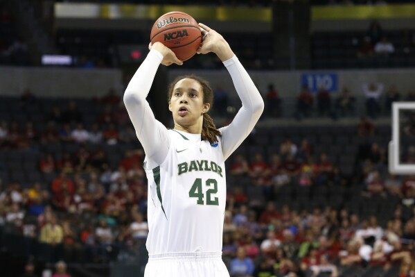 FILE - Baylor's Brittney Griner shoots a foul shot against Louisville in the second half of a regional semifinal game in the women's NCAA college basketball tournament in Oklahoma City, April 1, 2013. Baylor will retire the jersey of former star Griner, Feb. 18, 2024, when the Bears host Texas Tech. (AP Photo/Sue Ogrocki, File)