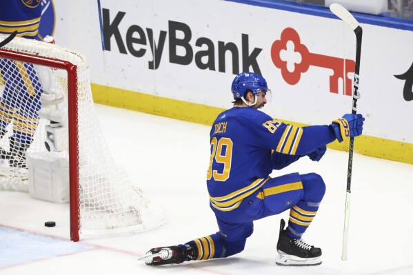 Buffalo Sabres right wing Alex Tuch (89) celebrates his game winning goal during the third period of an NHL hockey game against the Pittsburgh Penguins Friday, Nov. 24, 2023, in Buffalo N.Y. (AP Photo/Jeffrey T. Barnes)