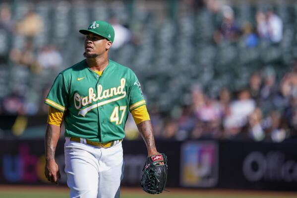 Oakland Athletics' Frankie Montas walks to the dugout after pitching against the Detroit Tigers during the third inning of the second baseball game of a doubleheader in Oakland, Calif., Thursday, July 21, 2022. (AP Photo/Godofredo A. Vásquez)