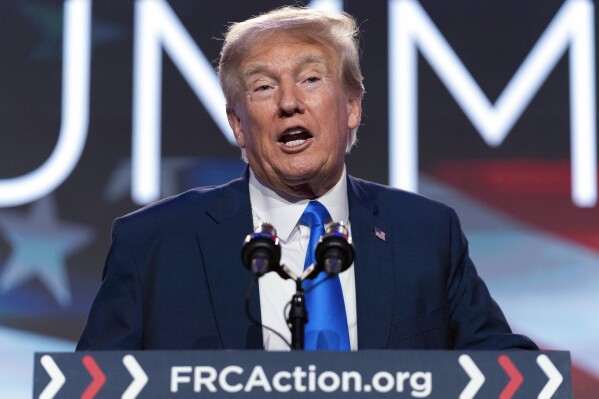 FILE - Former President Donald Trump speaks during the Pray Vote Stand Summit, Friday, Sept. 15, 2023, in Washington. Trump repeatedly declined in an interview aired Sunday, Sept. 17, 2023, to answer questions about whether he watched the Capitol riot unfold on television, saying he would “tell people later at an appropriate time.” (AP Photo/Jose Luis Magana, File)