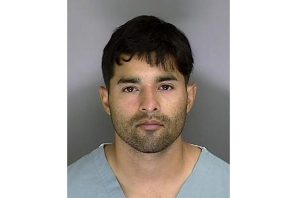 FILE - This booking photo from the Santa Cruz County Sheriff's Office shows Steven Carrillo on June 7, 2020. Court records filed Monday, Feb. 7, 2022, showed Carrillo, a former U.S. Air Force sergeant, plans to change his not guilty plea in the fatal shooting of a federal security officer in Northern California during 2020 protests against police brutality. (Santa Cruz Sheriff's Office via AP, File)