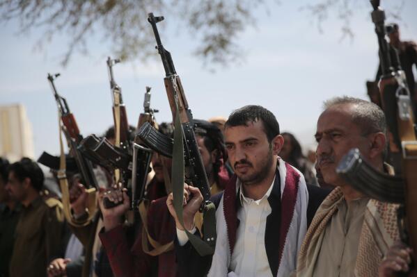 FILE - Armed Houthi fighters attend the funeral procession of Houthi rebel fighters who were killed in recent fighting with forces of Yemen's internationally recognized government, in Sanaa, Yemen, Wednesday, Nov. 24, 2021. The U.S. envoy to Yemen on Wednesday, Oct. 5, 2022,  blamed rebel Houthi leaders for the recent failure to extend the country's cease-fire agreement, accusing them of making last-minute ‘maximalist demands' that derailed constructive negotiations.    (AP Photo/Hani Mohammed, File)