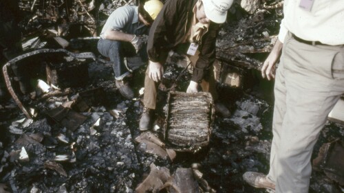 In this photo provided by the National archives, records from the sixth floor of the Military Personnel Records Center in Overland, Mo., near St. Louis, are recovered months after the massive fire that started on July 12, 1973. The box was soaked in water and covered completely with mold. (National Archives via AP)