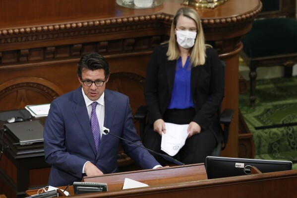 FILE -- Legislative Analyst Gabriel Petek, left, discusses Gov. Gavin Newsom's proposed 2020-21 revised state budget during a hearing the state Capitol in Sacramento, Calif., May 26, 2020. On Thursday, Dec. 7, 2023, Petek said California is facing a $68 billion budget deficit. (AP Photo/Rich Pedroncelli, Pool, File)