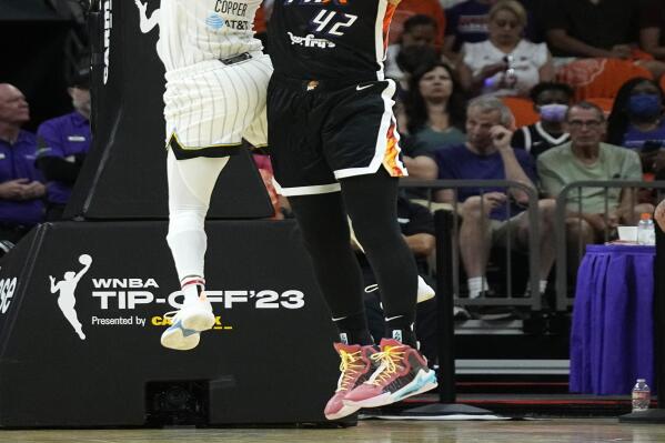 Phoenix Mercury center Brittney Griner (42) blocks the shot of Chicago Sky guard Kahleah Copper (2) during the first half of a WNBA basketball game, Sunday, May 21, 2023, in Phoenix. (AP Photo/Ross D. Franklin)