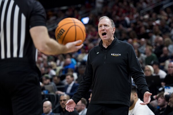 Long Beach State head coach Dan Monson reacts to an official's call during the second half of a first-round college basketball game against Arizona in the NCAA Tournament in Salt Lake City, Thursday, March 21, 2024. (AP Photo/Isaac Hale)