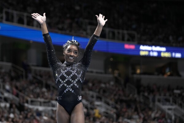 Simone Biles reacts after competing on the floor exercise during the U.S. Gymnastics Championships, Sunday, Aug. 27, 2023, in San Jose, Calif. (AP Photo/Godofredo A. Vásquez)