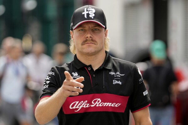 Alfa Romeo driver Valtteri Bottas of Finland gestures at the Monza racetrack, in Monza, Italy , Thursday, Aug. 31, 2023. The Formula one race will be held on Sunday. (AP Photo/Luca Bruno)