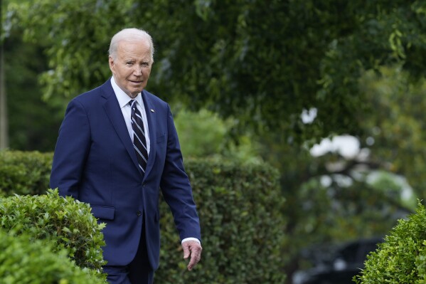 President Joe Biden arrives to speak in the Rose Garden of the White House in Washington, Tuesday, May 14, 2024, announcing plans to impose major new tariffs on electric vehicles, semiconductors, solar equipment and medical supplies imported from China. (AP Photo/Susan Walsh)