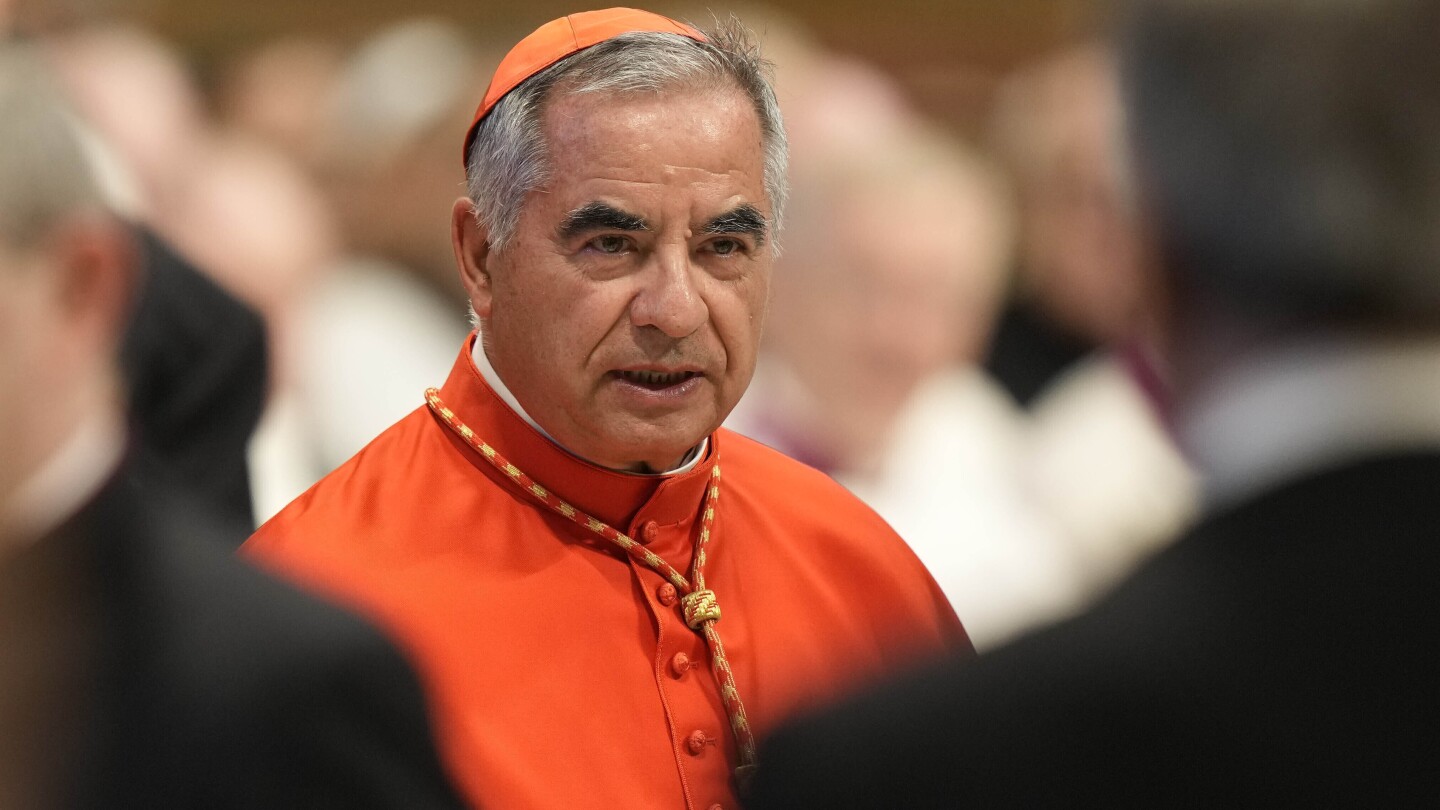 Cardinal at center of Vatican trial claims he has been 'reinstated' by Pope