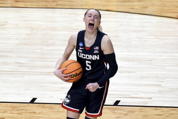 UConn guard Paige Bueckers reacts as the game ends during an Elite Eight college basketball game against Southern California in the women's NCAA Tournament, Monday, April 1, 2024, in Portland, Ore. (AP Photo/Steve Dykes)