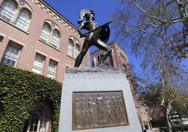 FILE - This Tuesday, March 12, 2019 file photo shows the iconic Tommy Trojan statue at the University of Southern California in Los Angeles. University of Southern California officials have canceled a commencement speech by its 2024 valedictorian, a pro-Palestinian Muslim, citing “substantial risks relating to security and disruption” of the event that draws 65,000 people to campus. (AP Photo/Reed Saxon, File)