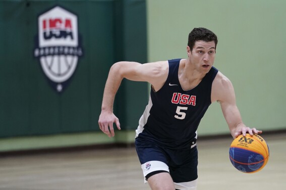 FILE - Jimmer Fredette practices for the USA Basketball 3x3 national team, Monday, Oct. 31, 2022, in Miami Lakes, Fla. USA Basketball announced its men’s 3x3 roster for the Paris Games on Tuesday, March 26, 2024, going with the same foursome that won a silver medal at the World Cup and gold at the Pan American Games last year.(AP Photo/Lynne Sladky, File)