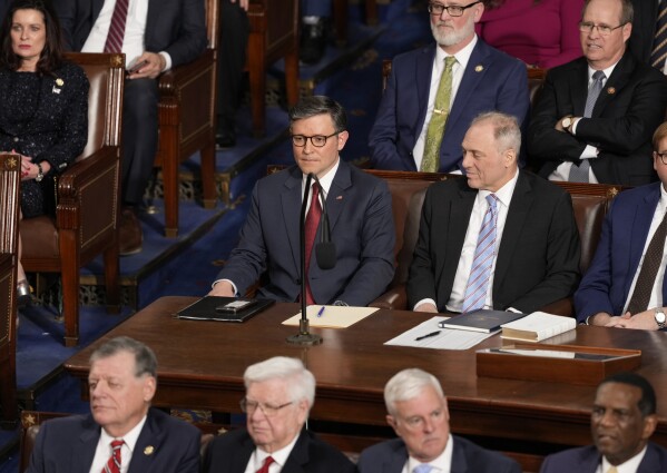 Speaker of the House Mike Johnson listens as his name is put into nomination as the House of Representatives convenes the 119th Congress with a slim Republican majority, at the Capitol in Washington, Friday, Jan. 3, 2025. (AP Photo/J. Scott Applewhite)
