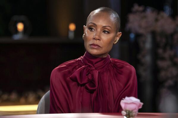 Jada Pinkett Smith appears on an episode of her online series "Red Table Talk." The latest episode, streaming Wednesday, June 1, 2022 on Facebook Watch, addresses Alopecia. (Jordan Fisher/Red Table Talk via AP)