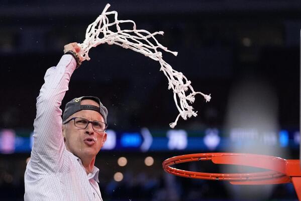 Connecticut head coach Dan Hurley celebrates during the net cutting after the men's national championship college basketball game against San Diego State in the NCAA Tournament on Monday, April 3, 2023, in Houston. (AP Photo/Brynn Anderson)