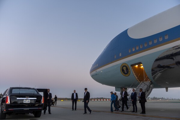 President Joe Biden walks to his limousine as he arrives on Air Force One, Saturday, June 15, 2024, in Los Angeles. Biden will attend a campaign event Saturday night. (AP Photo/Alex Brandon)