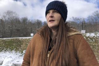 Sarah Kelly is shown Friday, Jan. 21, 2022, in Huntington, W.Va. After struggling with an opioid addiction most of her life, Kelly has been in recovery since October 2019. As a federal judge mulls a decision in a lawsuit filed by the city of Huntington and Cabell County over the role of three pharmaceutical companies in the local opioid crisis, Kelly said there are many recovery programs that could benefit if the plaintiffs prevail. (AP Photo/John Raby)