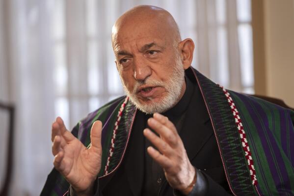 Former President of Afghanistan Hamid Karzai speaks during an interview with the Associated Press in Kabul , Afghanistan on Friday, Dec. 10, 2021. (AP Photo/Petros Giannakouris)