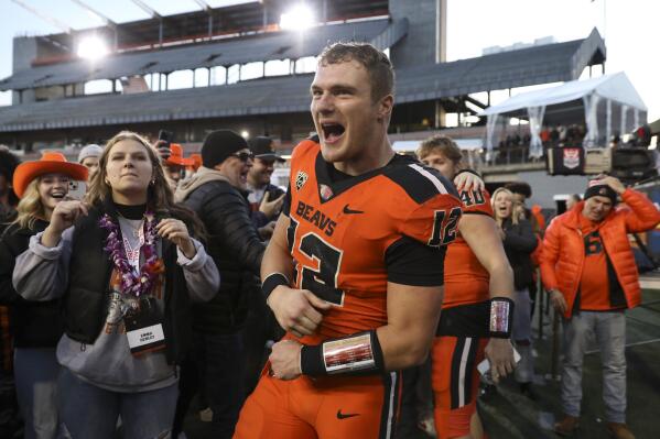 Oregon State linebacker Jack Colletto (12) celebrates after his team's win over Oregon in an NCAA college football game on Saturday, Nov 26, 2022, in Corvallis, Ore. (AP Photo/Amanda Loman)