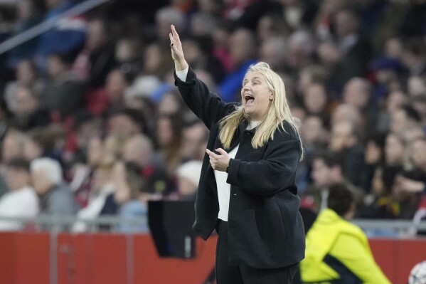 FILE - Chelsea's coach Emma Hayes gestures during the Women's Champions League quarterfinal soccer match between Ajax and Chelsea at the Johan Cruyff Arena, in Amsterdam, Netherlands, Tuesday, March 19, 2024. Coach Emma Hayes has selected her first roster for the United States ahead of a pair of friendlies as she prepares to lead the women’s national team at the Paris Olympics. Hayes, named U.S. coach last November, finished her final season as coach of Chelsea on Saturday, winning the team's fifth straight Women's Super League Title with a 6-0 rout of Manchester United. (AP Photo/Peter Dejong, File)