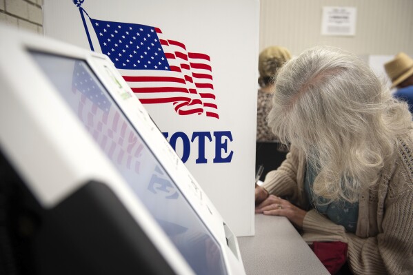 FILE - Voters fill in their ballots at at Precinct 5 at Wood Activity & Therapeutic Center in Clinton, Miss., during the general election, Nov. 7, 2023. The chairman of a congressional committee that has broad oversight of U.S. federal elections says ballot shortages in Mississippi's largest county could undermine voting and election confidence in 2024 if local officials don’t make changes. (Barbara Gauntt/The Clarion-Ledger via 鶹ýapp, file)