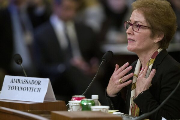 Former U.S. Ambassador to Ukraine Marie Yovanovitch testifies before the House Intelligence Committee on Capitol Hill in Washington, Friday, Nov. 15, 2019, during the second public impeachment hearing of President Donald Trump's efforts to tie U.S. aid for Ukraine to investigations of his political opponents.  (AP Photo/Alex Brandon)