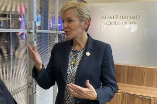 U.S. Energy Secretary Jennifer Granholm gestures as she speaks at the UN offices in Vienna, Monday Sept. 25, 2023. Granholm has emphasized the importance of nuclear fusion as a pioneering and future-oriented technology in the clean energy transition. As part of its clean-energy agenda, the Biden administration wants to "create a commercial nuclear fusion facility within 10 years," Granholm said in an interview with The Associated Press in Vienna. (AP Photo/Stephanie Liechtenstein)
