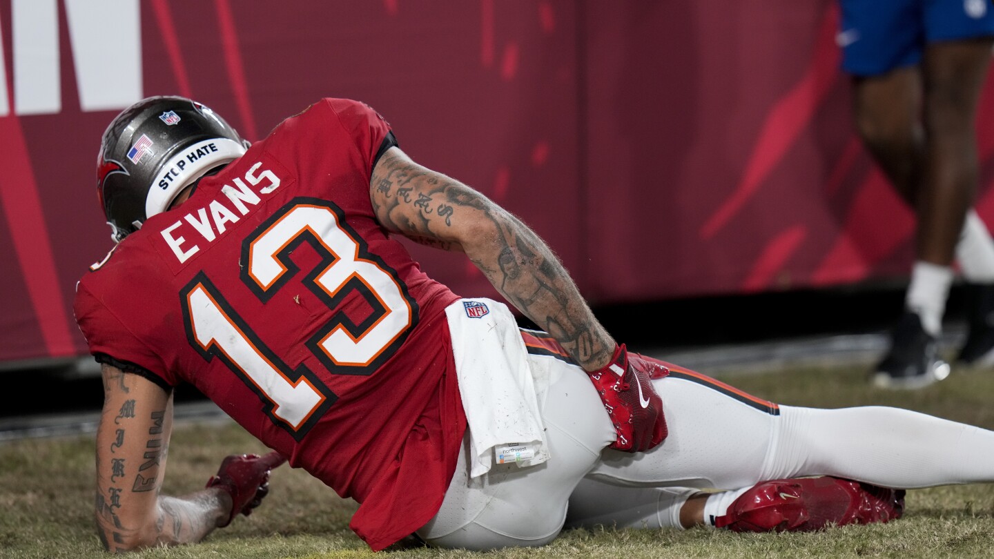 The Buccaneers lose top receivers Evans and Godwin to injuries, a double-digit loss to the Ravens