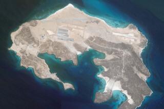 An air base under construction is seen on Mayun Island, Yemen, in this June 1, 2021, satellite photo taken by Planet Labs Inc. A militia leader who is the nephew of Yemen's late strongman president has acknowledged in an interview published Monday, June 14, 2021, that his Emirati-backed troops are stationed on an island in a crucial maritime chokepoint where a mysterious air base is now under construction. (Planet Labs Inc. via AP)
