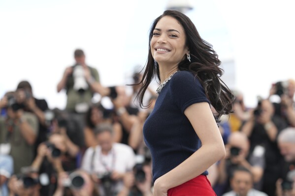 CORRECTS BYLINE: Elodie poses for photographers at the photo call for the film 'Fuori' at the 78th international film festival, Cannes, southern France, Wednesday, May 21, 2025. (Photo by Natacha Pisarenko/Invision/AP)