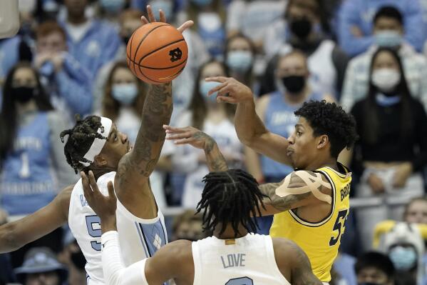 Physical altercation sparks scoring run, propels UNC men's basketball past  Michigan 