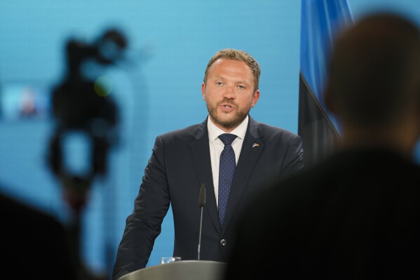 FILE - Estonian Foreign Minister Margus Tsahkna briefs the media during a joint news conference with German Foreign Minister Annalena Baerbock after a meeting at the Foreign Ministry in Berlin, Germany, Tuesday, Aug. 22, 2023. Estonia will allow Taiwan to open a nondiplomatic representative office of Taipei in the Baltic country to boost economic and cultural ties with the self-governing island but pledged to stick with the “One China” policy in political relations. (AP Photo/Markus Schreiber, File)