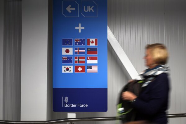 In this picture taken Saturday, Aug. 31, 2019, a passenger arrives at the airport of Edinburgh, Scotland. Scots voted in 2014 to remain in Britain but now they are having second thoughts and independence advocates want another referendum. (AP Photo/Francois Mori)