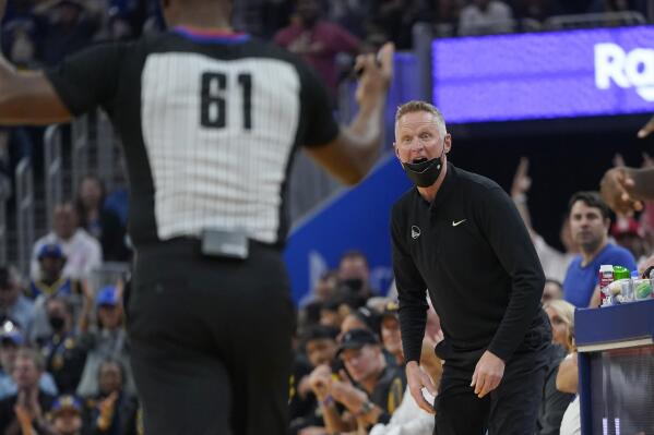 Golden State Warriors coach Steve Kerr, right, reacts to referee Courtney Kirkland (61) after a call during the first half of Game 3 of the team's NBA basketball Western Conference playoff semifinal against the Memphis Grizzlies in San Francisco, Saturday, May 7, 2022. (AP Photo/Jeff Chiu)