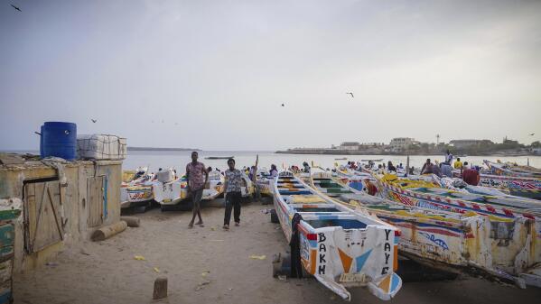 Fishing boats are lined up at the Soumbedioune fish market in Dakar, Senegal, May 31, 2022. (AP Photo/Grace Ekpu)