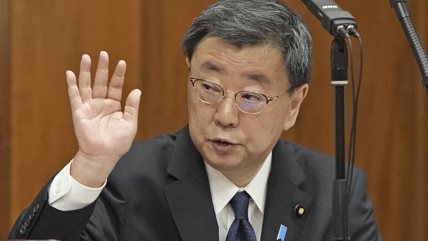 ТОКИО AP — Възмутени японски опозиционни депутати внесоха вот на
