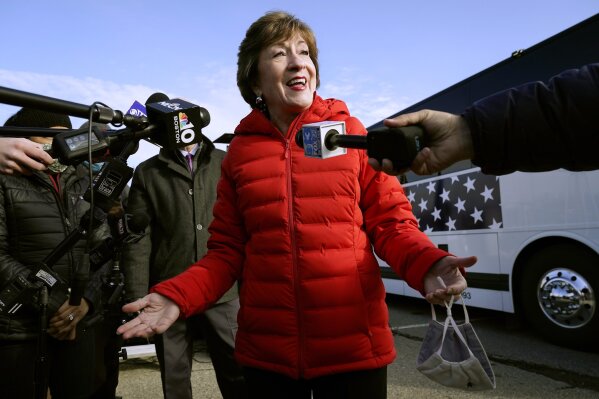 FILE - In this Nov. 4, 2020, file photo Republican Sen. Susan Collins, R-Maine, speaks to reporters in Bangor, Maine.A bipartisan group of lawmakers, including Collins, is putting pressure on congressional leaders to accept a split-the-difference solution to the months-long impasse on COVID-19 relief in a last-gasp effort to ship overdue help to a hurting nation before Congress adjourns for the holidays. (AP Photo/Robert F. Bukaty, File)