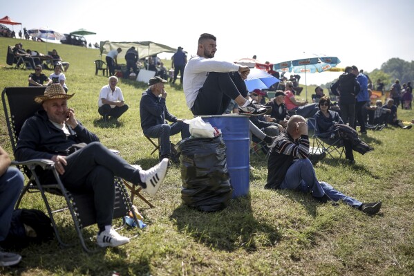 People watch the bullfights in Bijelo Polje, Bosnia, Sunday, May 11, 2025. (AP Photo/Armin Durgut)